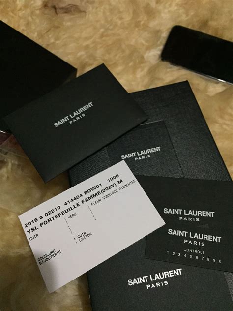 ysl bag authenticity card|authentic YSL handbag clutch.